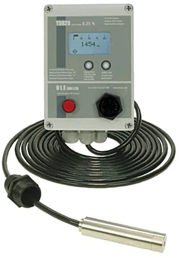 An O.L.E contents gauge — wall-mounted display unit with a submersible pressure probe on a cable